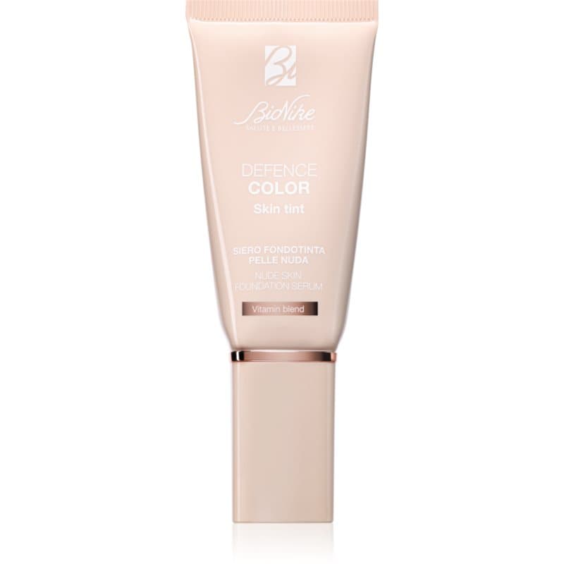 Defence Skin Tint długotrwała baza pod makijaż SPF 15 odcień 704 - CARAMEL
