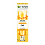 Skin Naturals Vitamin C Fluid rozświetlający do twarzy SPF50 - Niewidoczny